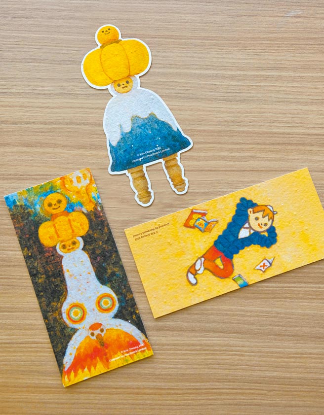 4月26日至5月31日期间，于台北信义新天地、台中中港店和台南新天地，与暖心治癒所展览作品合照上传，可兑换「暖心种子书籤」。（新光三越提供）