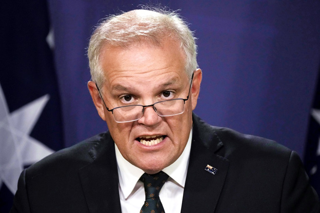 针对普丁想参加G20峰会，澳洲总理莫里森（Scott Morrison）24日开炮：「和被控犯下战争罪的人坐一桌太过了。」（资料照／美联社）