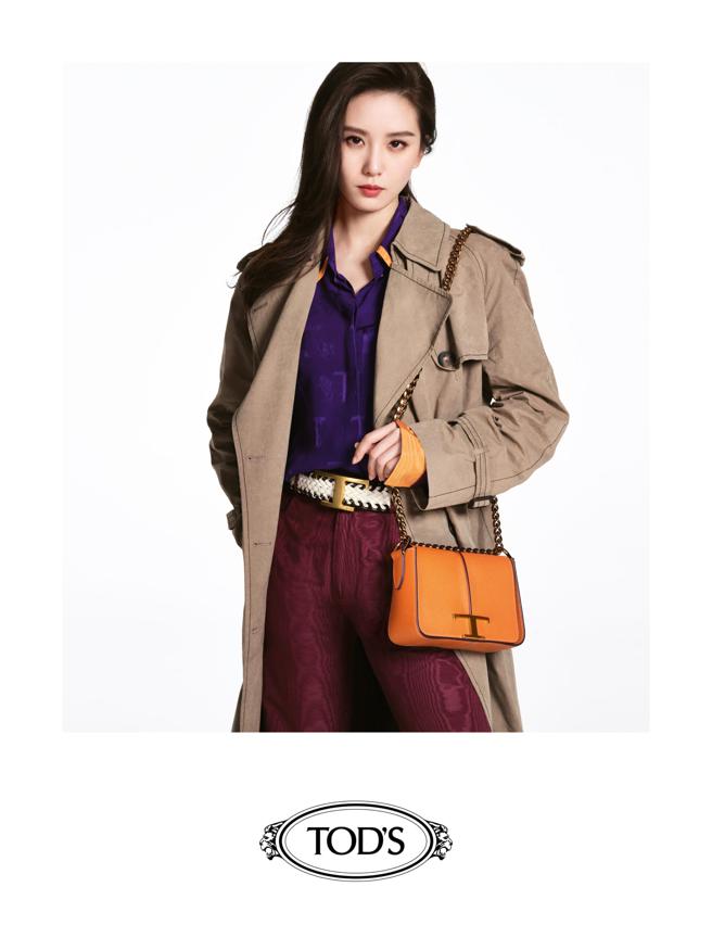 刘诗诗以抢眼的紫色、酒红色内搭，外搭低调的卡其色风衣，呈现优雅的义式风范。（Tod’ｓ提供