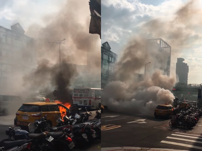 北市士林区中正路242号前今（30）下午3点发生1辆计程车自燃，64岁许姓驾驶开车开到一半闻到车身烧焦味，赶紧下车后就窜出火势。（翻摄自杨中化脸书）