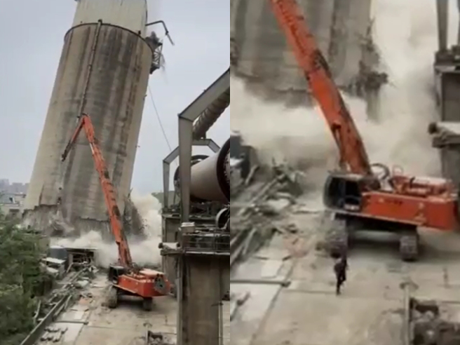 怪手用大铁球不断敲击水泥塔，敲击到一半塔面就出现水泥碎屑，随后塔中央就出现整条裂缝，整座塔开始向下倾斜倒塌，该怪手司机则赶紧「跳下车」往后方逃。（翻摄画面）