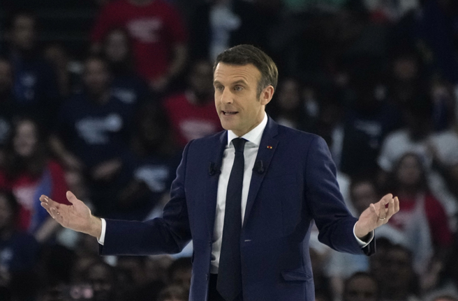 最新民调显示，马克宏与极右派雷朋支持度逐渐拉近，差距仅5%。(图／美联社)