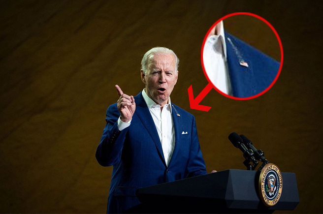 拜登在爱荷华州演讲，过程遭不明白色末屑掉落在西装上，掀起话题。（图／路透社）
