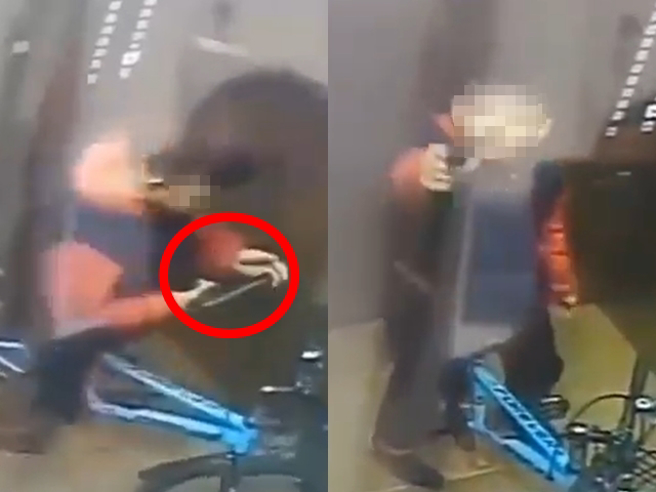 1名年幼男童骑脚踏车进电梯后，先是把玩手中的枪，接着他竟扣动扳机、朝角落的监视器射击，甚至仅用1发就将监视器击坏，动作俐落、神情果断。（翻摄自脸书「爆废公社」）