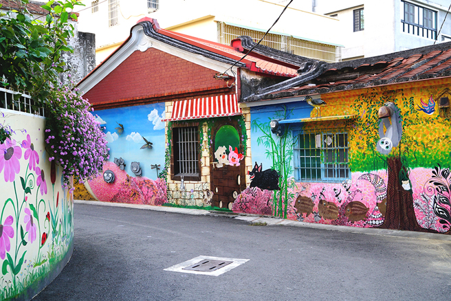 梓平藉农村再生计画，动员居民参与美化社区。(摄影/Cindy Lee)