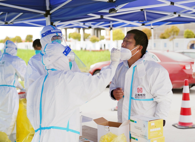 外媒引述消息人士稱，上海已設定於4月20日解除封城措施，逐步恢復市民正常生活。（圖／新華社）