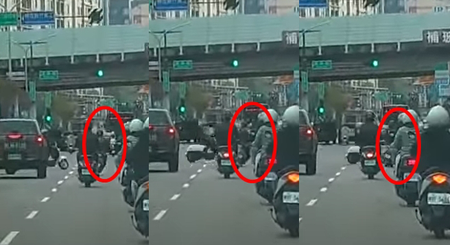新竹市東區中華路二段8日發生一起機車車禍，紅圈處可見直行的男騎士見左側衝出違規女騎士，緊急往右切，卻仍遭擊落。（翻攝自YouTube頻道「WoWtchout - 地圖型行車影像分享平台」）