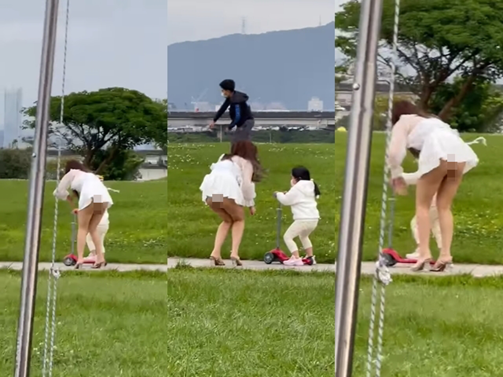 短裙女子在公園陪孩子玩耍，隨風飄盪的裙襬下竟露出裡頭的丁字褲，美腿與臀部就這樣「全被看光光」，周圍民眾拍下影片笑說「小姐好冷喔」。（翻攝自臉書「爆廢公社公開版」）