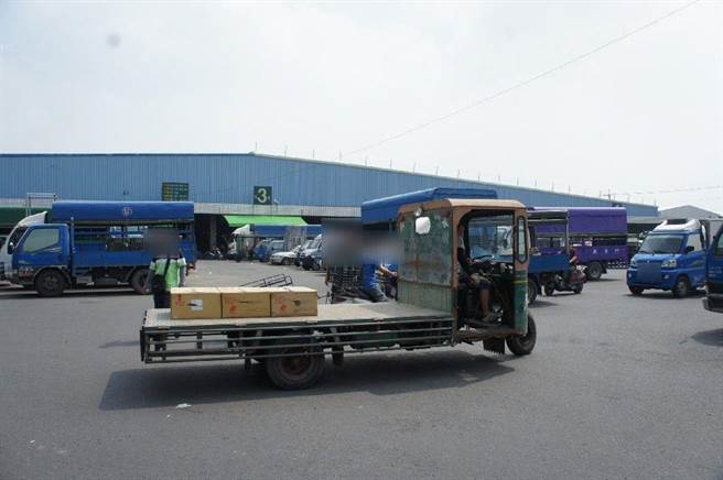 西螺果菜市场防疫受关切，不过出入者多无意快筛。（本报资料照片）