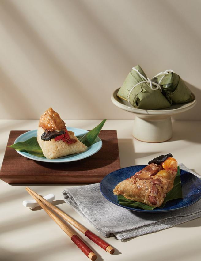 爱买嚐嚐九九精品飘香端午礼盒，含帝王麻油鸡粽2粒、飘香封肉油葱粽2粒，5月底前特价399元。（爱买提供）