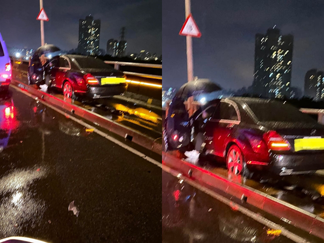 新北市福和桥今（12）晚7时许发生1辆轿车疑似不熟悉路况，竟开上机车道当场被左右护栏卡死，导致后方无法通行，现场塞爆。（翻摄自脸书「我是永和人」）