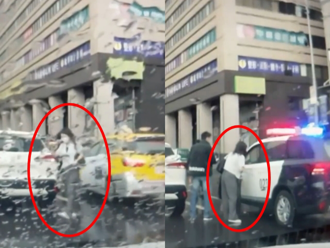 新聞台採訪車發生擦撞停在馬路中，女記者從採訪車下來後向員警說了一下，就直接與另名男攝影記者搭上警車離去，留下事故轎車不管。（翻攝自臉書「八卦村-行車紀錄器影片上傳中心」）