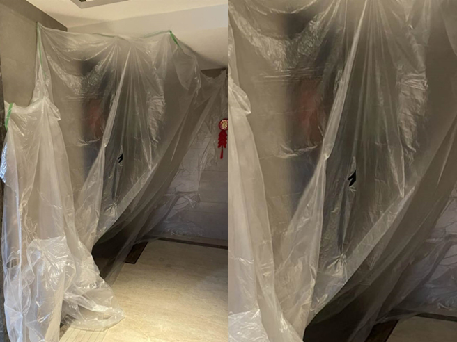 該住戶確診後，魏姓前妻在幫忙送餐時發現，大樓管委會竟「私下」在該戶門口貼滿塑膠布，主委稱怕拿食物時散播病毒。（翻攝自爆料公社）