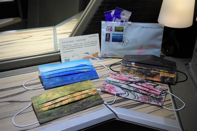 台湾风情系列将大师林淑女〈凌宵花语〉、王慎敏〈海的曼荼罗〉、李沃源〈烟火之夜〉及〈阿里山春樱〉等画作印上口罩。（华航提供）