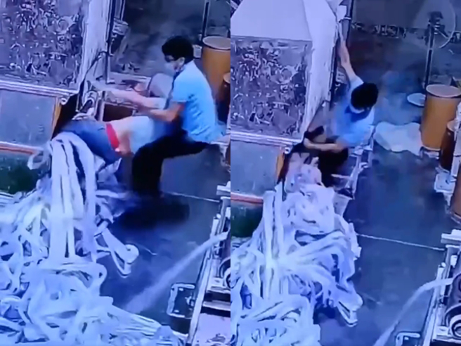 男子操作搅碎机时，左脚遭地上带子缠住，遭拖进机器内，一旁同事按下一旁设在高处的紧急钮，男子才卡在机器入口捡回一命，被拉出后趴在地上吓坏。（翻摄自爆料公社）