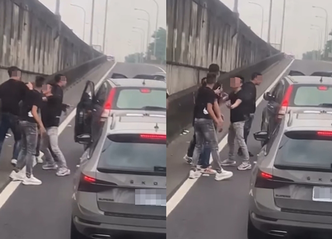 休旅車交流道遭6、7名「黑衣人」攔下，後方駕駛拍下事發過程嗨喊「現場LIVE欸唷」。（翻攝自臉書爆料公社二社）