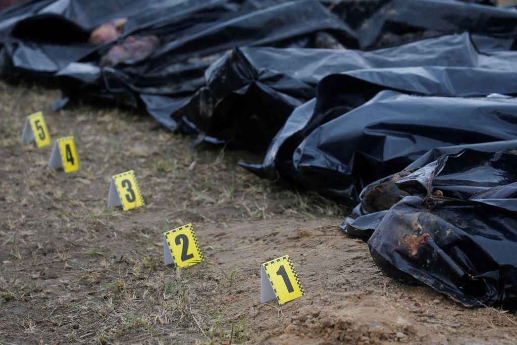 俄军押了至少9名男子至首都基辅Kyiv郊外进行处决后再弃尸。图/路透社(photo:ChinaTimes)