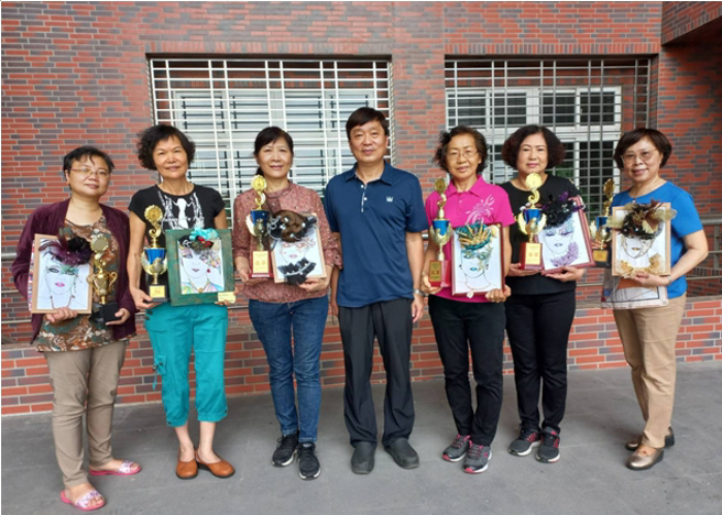 111台湾区亚太杯美业暨美馔艺术美学交流竞赛，高苑科技大学获奖团队。(照片/高苑科大提供)