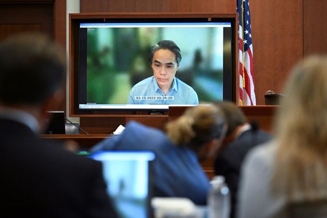 DC总裁滨田沃特以视讯方式出席法庭。（图／路透社）