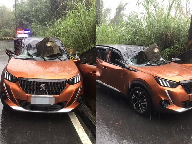 阿里山乡达邦公路明隧道出口今接连发生2起落石砸中轿车事件，数颗巨石瞬间从山壁落下，当场砸中轿车还挡住车道、一度阻断交通，甚至有巨石砸烂挡风玻璃。（竹崎分局提供）