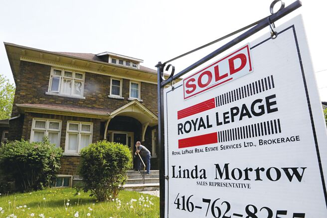 升息阻断房市荣景图╱路透