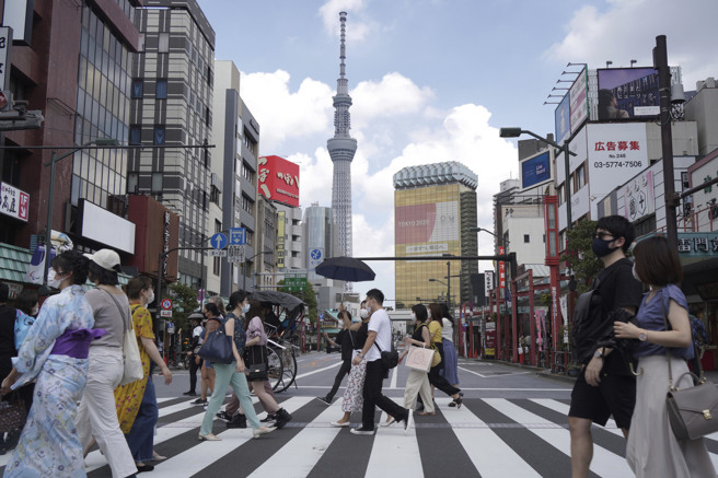 日本政府日前公布政策方向，預計從6月10日重新開放外國觀光客入境。(圖／美聯社)