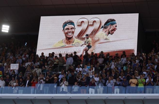 纳达尔夺冠之后，法网中央球场大萤幕立刻打出大满贯生涯22冠的庆祝画面。（路透）