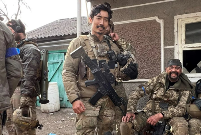 至乌克兰作战后返国的韩国YouTuber李根大尉。(图/路透社)