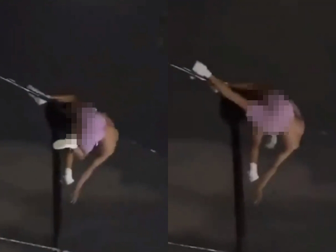 1段影片在网路疯传，1对男女在铁丝网围墙上忘情发生关系，2人卡在铁丝网最上方，男子压在女子身上，下半身猛抽动，不顾下方一票群眾。（翻摄自脸书「爆废公社公开版」）