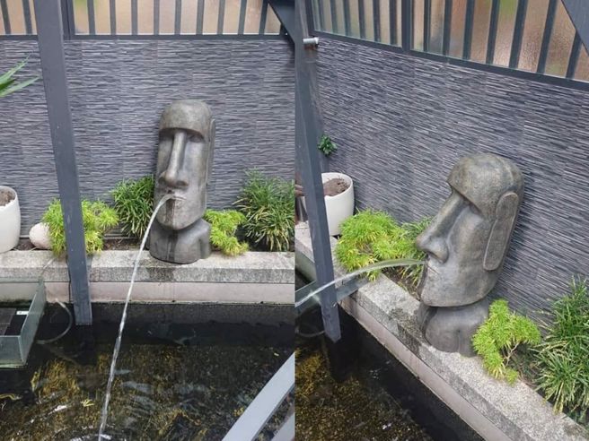 摩艾石像从嘴里吐出水，变成水池的造景摆设。(图翻摄自/脸书/Costco好市多 商品经验老实说)