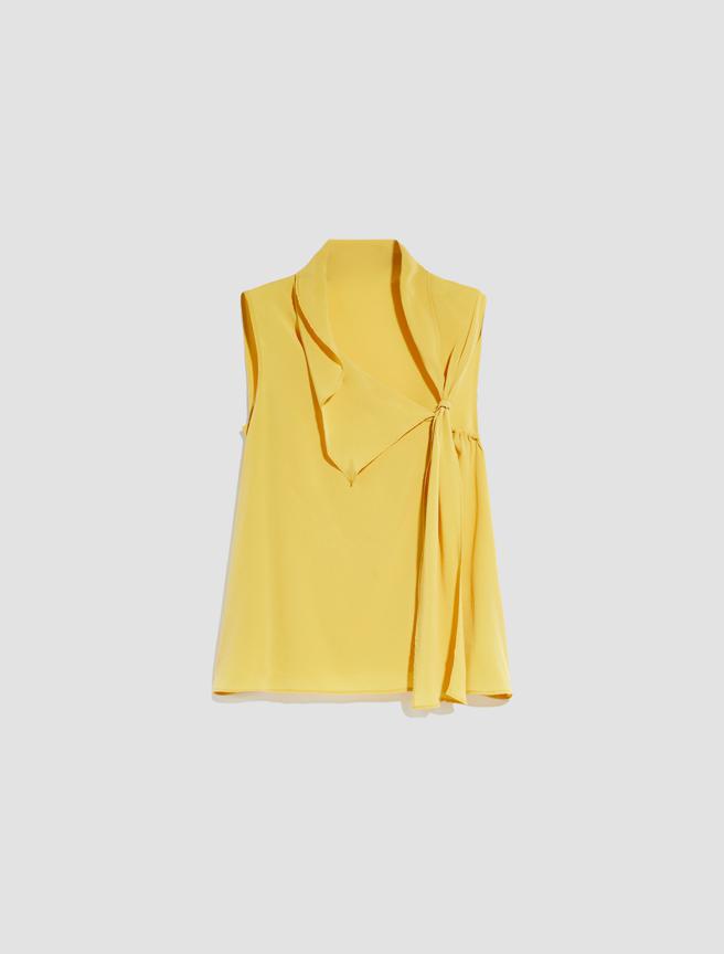 义大Outlet Mall的MaxMara 真丝不规则剪裁上衣，原价9900元，E-DA价3960元。（义大Outlet Mall提供）