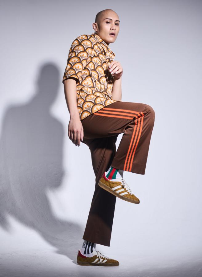 YELLOW歌手黄宣接受本报邀请进棚拍摄adidas x Gucci双联名男装专题，展现嘻哈时尚的前卫魅力，LOGO短袖外套11万1000元，运动长裤4万2000元。（JOJ PHOTO摄，图片企画／中时时尚）