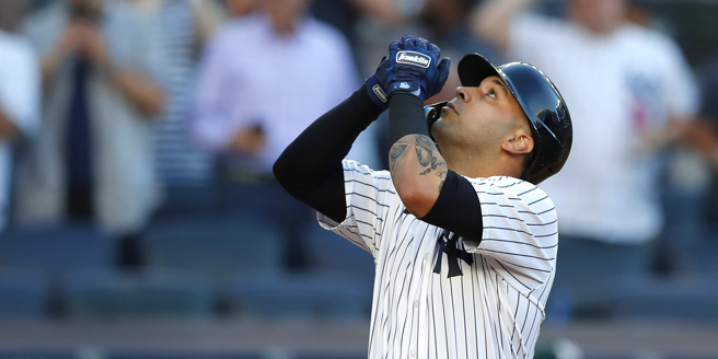 洋基左外野手M.冈扎勒斯开轰后庆祝(美联社)
