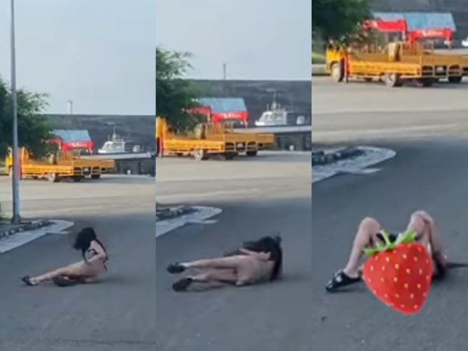 女網友身穿緊身洋裝在斜坡玩滑板，原本過程看似順利，最後她卻不幸失足摔倒，當場跌躺在地，雙腳抬起時還走光露出內褲、膝蓋受傷。（翻攝自臉書「爆廢公社」）