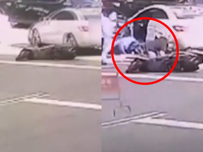 騎士卡在轎車底部，民眾見狀拿出千斤頂，在10多人合力幫忙下將人救出，因當時大熱天，還有人在地上撒冰塊降溫，避免騎士被燙傷「二次傷害」。（翻攝自中視畫面）