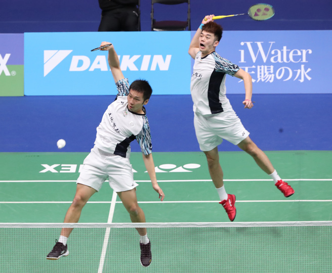 羽球男雙組合李洋（左）、王齊麟（右）在台北羽球公開賽闖入8強。（鄭任南攝）

