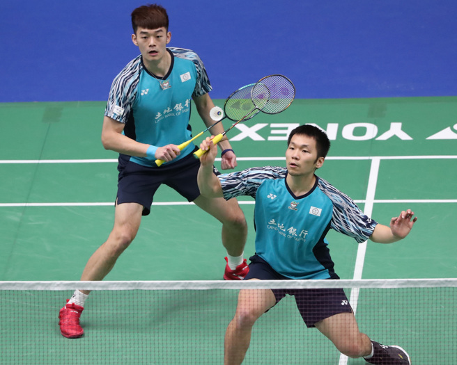 东京奥运羽球双打金牌李洋与王齐麟22日在台北羽球公开赛男双8强战中，以2:0击败台湾的李佳翰与林永晟的男双组合，晋级男双4强赛事。（郑任南摄）