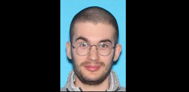 嫌疑人23歲的謝溫，他已死亡，身上有槍傷。(圖/美聯社)