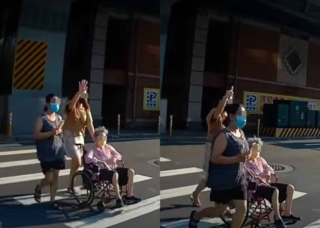 骑士在路口因停车礼让行人，被推轮椅的正妹比讚，感谢骑士友善的礼让。（翻摄自YouTube频道「WoWtchout - 地图型行车影像分享平台」）
