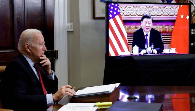 美中元首通話如期進行。（路透）