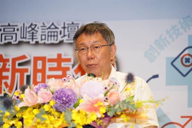 台北市長柯文哲今出席活動被問及昔日愛將邱豐光投靠陳時中，柯文哲不願回應。（陳薏云攝）