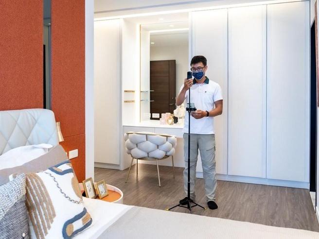 （信义房屋设置一组成立超过10年的影像故事团队，旗下有30位专职摄影师，为委托客户提供DiNDON智能赏屋（环景摄影）、精致拍照服务。图∕业者提供）