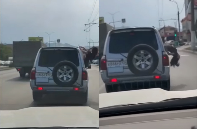 长髮女子将上半身伸出车窗大跳艷舞，不料下秒乐极生悲，直接以倒插之姿摔车倒地。（图片翻摄自YouTube/News_24）