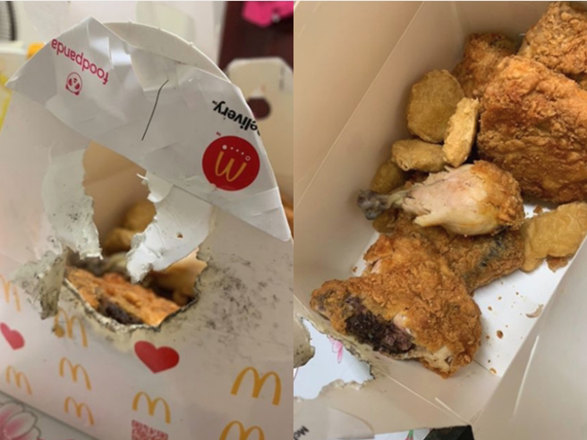 网友点外送麦当劳，送来的餐点纸盒竟被烧出1个破洞，里头的炸鸡也被人吃过，他事后回报客服，对方还一度拒绝退款，最后甚至关闭对话视窗。（翻摄自脸书「记者爆料网」）