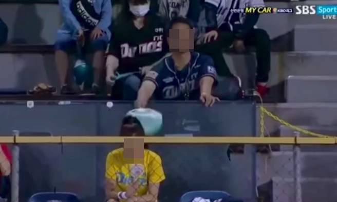 大叔在后面热心狂搧风。(翻摄脸书寰泰运动新闻)
