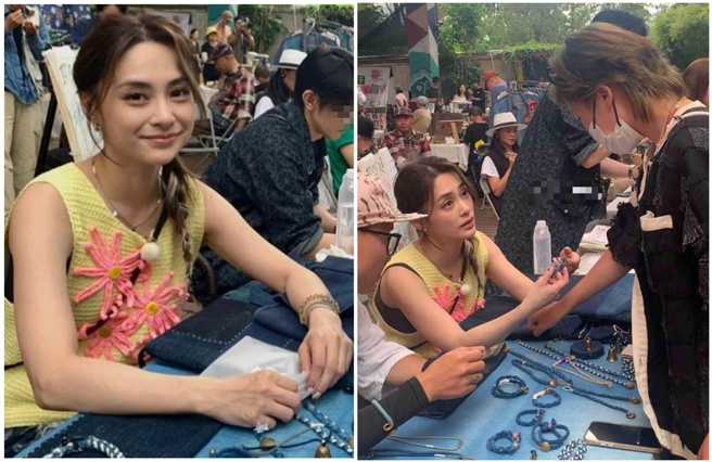 阿娇亲自帮粉丝戴手环。（图／微博）