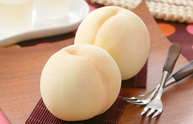 冈山白桃，高雅白皙色泽，娇嫩欲滴。（商田实业提供）