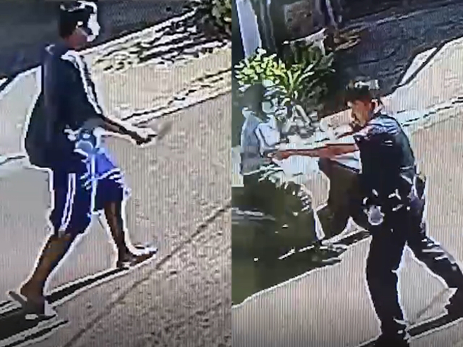 监视器影像曝光，只见男子恶狠狠地持刀走向员警，员警拿枪威吓并不断后退。（翻摄画面）