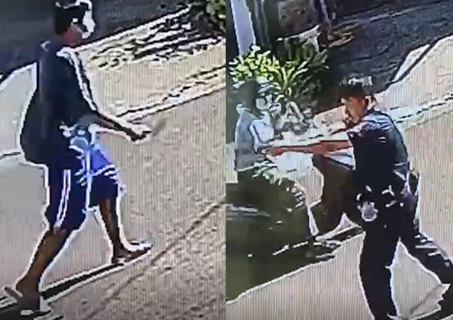 台南一名员警开枪自卫，路旁阿北竟超淡定观看。（翻摄画面）