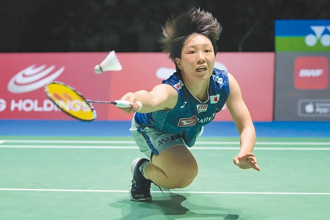 山口茜以2比1击败陈雨菲，完成羽球世锦赛女单连霸。（美联社）